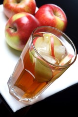 Glass of apple juice with ice