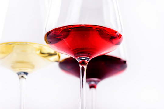 Three glass of red, rose and white wine isolated over white background. Wine card menu design.