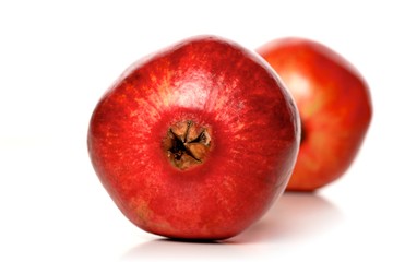 Studio shot of pomegranate fruit