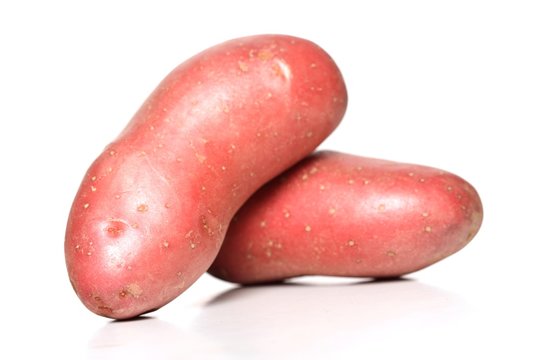Red potaoes on white background