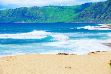 Beautiful ocean  coastline of Hawaii, waves crashing on beach