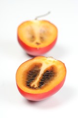 Close-up of tamarillo on white background