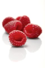 Raspberries on white backbround - close-up