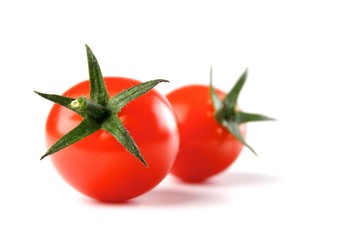 Tomatoes on white background - close-up