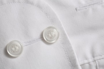 Close-up of buttons on cloth