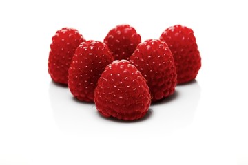 Raspberries on white backbround - close-up