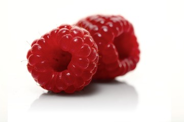 Raspberries on white backbround - close-up