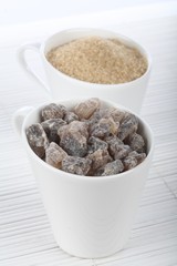 Brown sugar in white cups