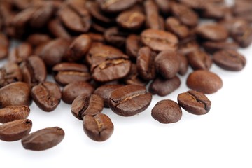 Rosted coffee grains on white backgorund