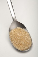 Brown sugar and spoon - close-up