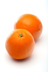 Oranges on white background - close-up