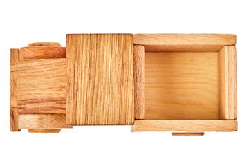 Wooden toy truck isolated on white background. Close up.