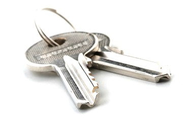 Door keys on white bacglround - close up