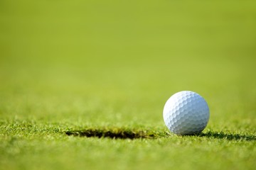 Golf ball near hole