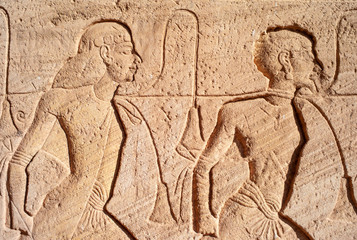 Fototapeta na wymiar Abu Simbel - Relief Detail depicting Slaves on the Great Temple