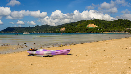 Canoe Kayak left on Las Cabanas beach, El Nido, Palawan, Philippines