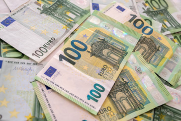 Obraz na płótnie Canvas A couple of 100 Euro banknotes European currency