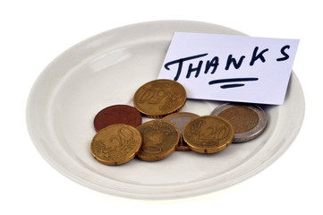Tip with a thank you card close-up on a white background