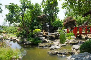 Fototapeta na wymiar Japanese garden style with waterfall