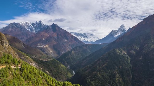 Ama Dablam and Taboche Mountains on Sunny Day. Himalaya, Nepal. Timelapse