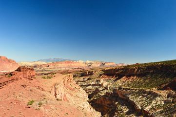 Fototapeta na wymiar Extraordinary landscape, mountains and rocks views from viewpoint in the Capitol Reef national park in south central Utah
