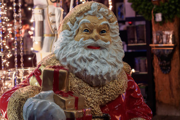 Santa Claus figurine with a gift
