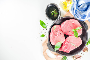 Raw fresh meat steaks with spices