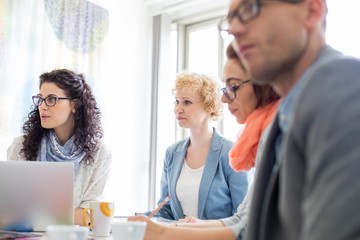 Creative businesspeople in meeting at office