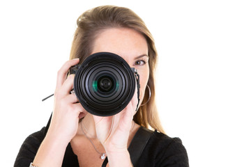 Portrait of smiling young blonde woman posing white background