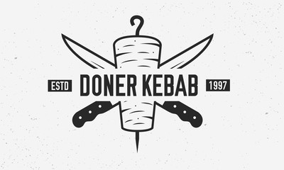 Doner Kebab vintage logo template. Doner Kebab with kebab knives isolated on white background. Retro poster for shop, restaurant, kebab cafe. Vector illustration