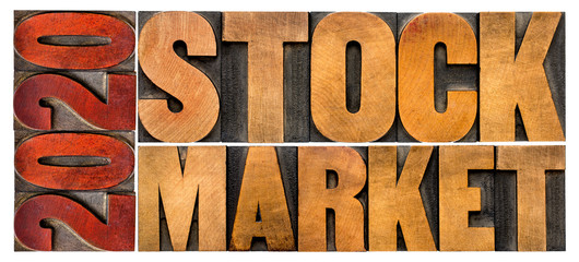 2020 stock market word abstract in wood type