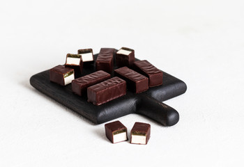 Souffle, jelly, souffle in chocolate, candy, chocolate candy with souffle, dessert, dessert in chocolate, fruit jelly, light background, sweets, Goodies, Goodies, loose, piece dessert, food, sweet foo