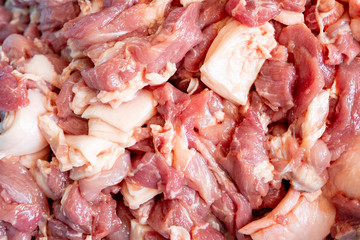 pink pork slice meat on wooden butcher background