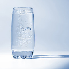 water with air bubbles in transparent glass