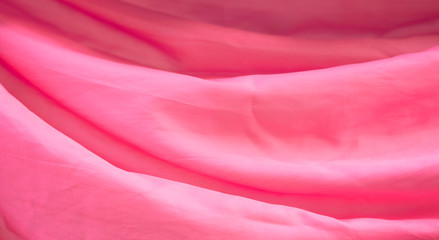 Shine Pink pearl fabric silk or satin luxury cloth texture, Smooth elegant chiffon background.