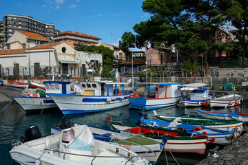 Fototapeta na wymiar fishing boats in Porto di San Giovanni li Cuti in Catania, Sicily, Italy