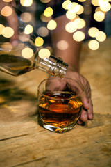 Barman pouring whiskey whiskey glass beautiful night