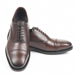 Classic men's brown Oxford shoes on white background. Leather shoes
