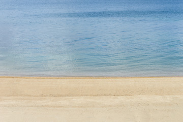 Fototapeta na wymiar coastline yellow sand and blue sea water landscape
