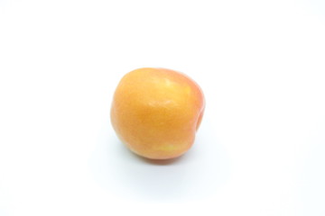 Ripe plum located on a white background