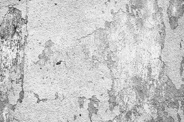 Texture of a concrete wall with cracks and scratches which can be used as a background