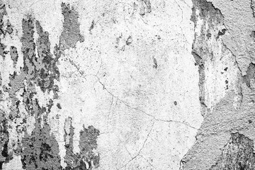 Texture of a concrete wall with cracks and scratches which can be used as a background