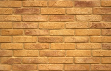  Brick wall made up of sand-brown bricks. Nice decorative background for the interior.