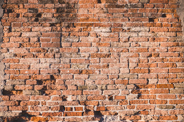 Red old brick wall texture loft grunge background. Italian masonry