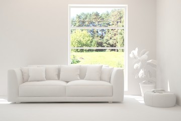 Fototapeta premium Mock up of stylish room in white color with sofa and green landscape in window. Scandinavian interior design. 3D illustration