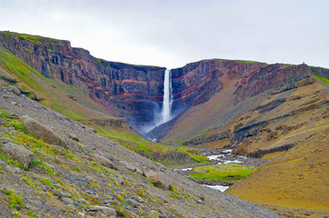 Impressive and breathtaking view onto Iceland´s fourth tallest or highest waterfall cascade...