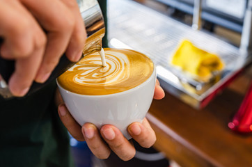 Barista making a cup of coffee