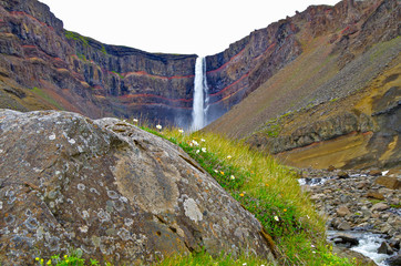 Impressive and breathtaking view onto Iceland´s fourth tallest or highest waterfall cascade...