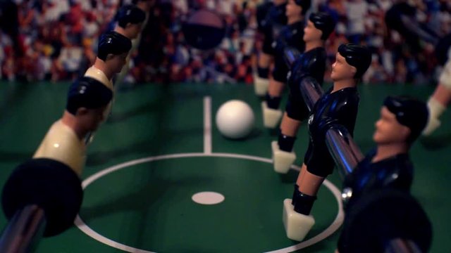 Games, entertainment, hobbies and leisure.foosball.plastic players in the table soccer.game kicker close up.Shallow depth of field