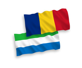 Flags of Romania and Sierra Leone on a white background